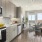 a kitchen with a wood floor