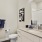 a bathroom with a sink toilet and a shower