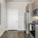a kitchen with wooden cabinets