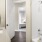 a bathroom with a tub sink and toilet