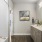 a bathroom with a tub and sink