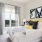 a bedroom with a large window