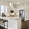 a kitchen with white cabinets